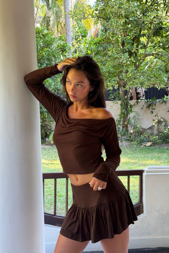 A fitted skirt with a ruffled hem, made in our sustainable bamboo-cotton stretch blend.